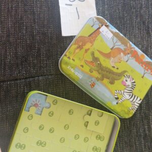 Mehrere Puzzle in Dose