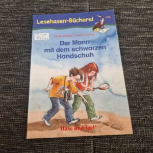 Buch  Lesebuch der mann mit den schwarzen Handschuhen